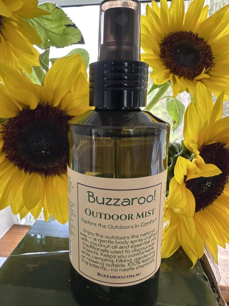 Buzzaroo! Image of a small green spray bottle containing outdoor mist which may control insects on your skin